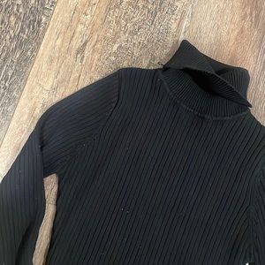 I’m selling a black simple turtleneck with long sleeves